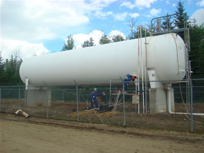 Bakos employees carrying out propane vessel inspection