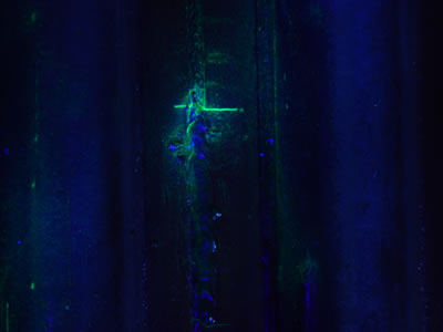 Fluorescent MT performed on boiler skin casing showing crack